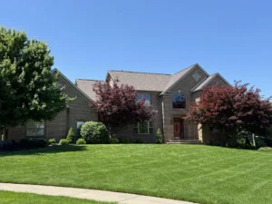 Completed roof replacement on a brick home in Broadview Heights, Ohio by 4K Roofing and Restoration